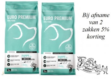 Bij afname 2 zakken puppy 12kg  medium